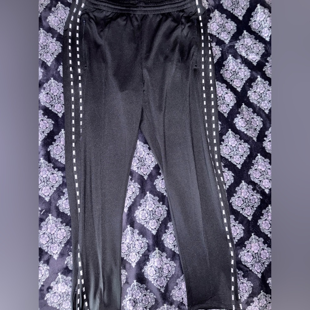 PINK Victoria's Secret Joggers with zippers at the bottom of each leg.